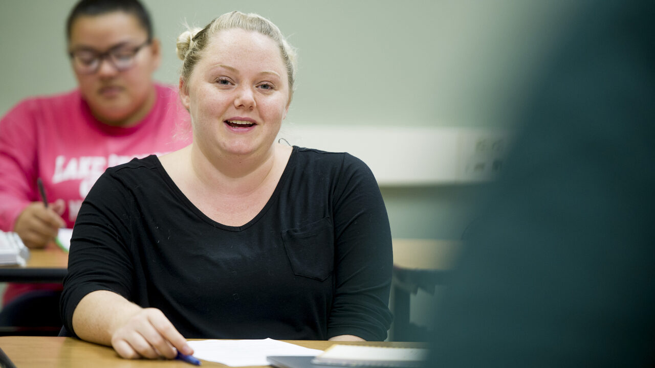 Student in a classroom discussion